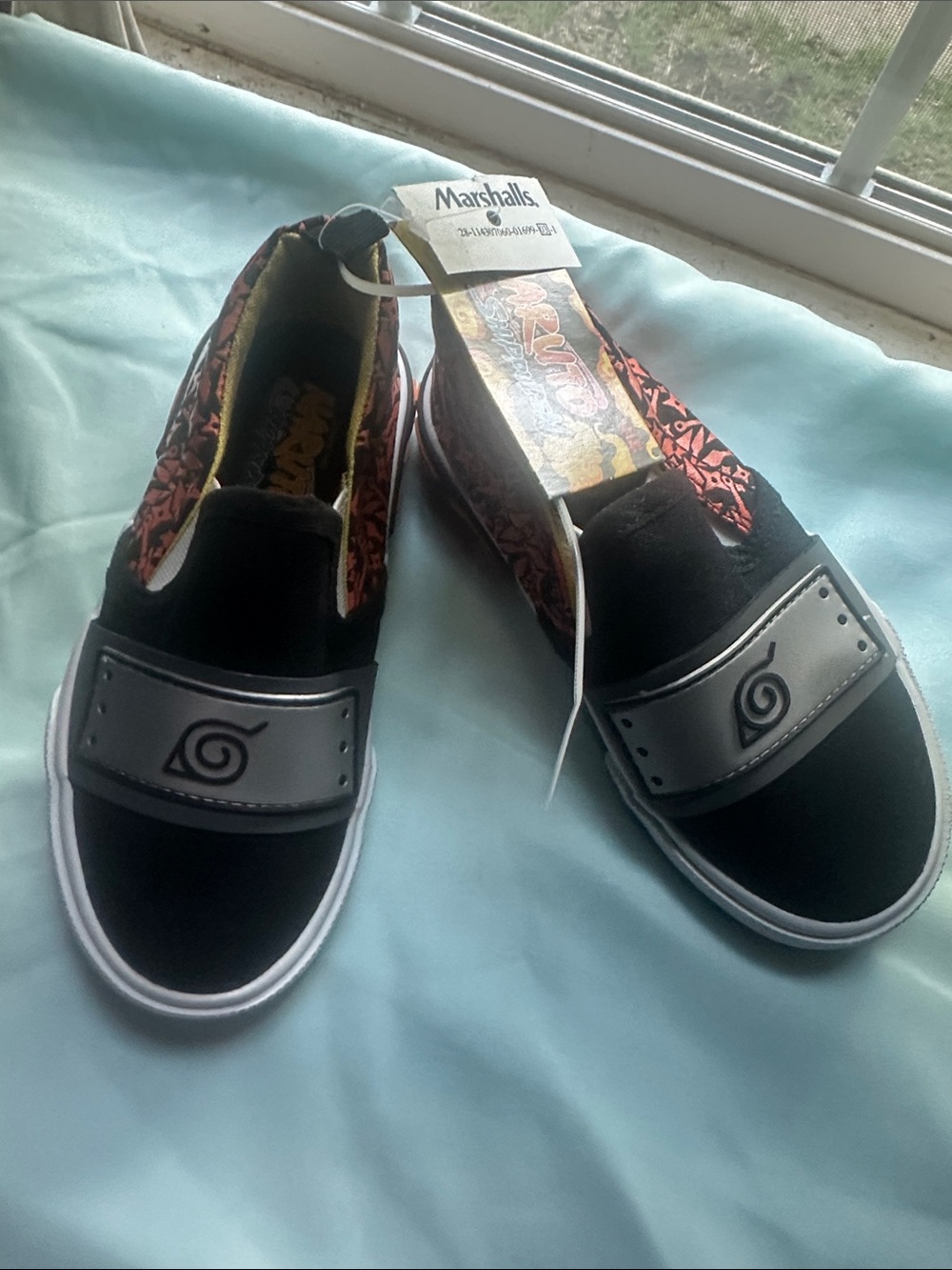 Marshalls             Kids 
Black Slip-On Sneakers with Red Patterned Trim